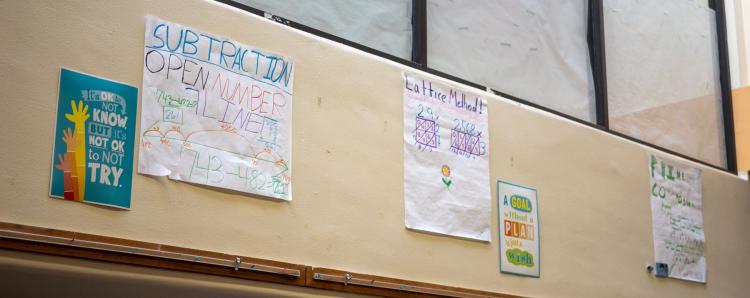 School posters on wall:  It's ok not to know, but it's not ok to not try and a goal without a plan is just a wish.