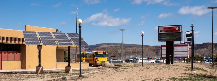 school bus parked outside school building